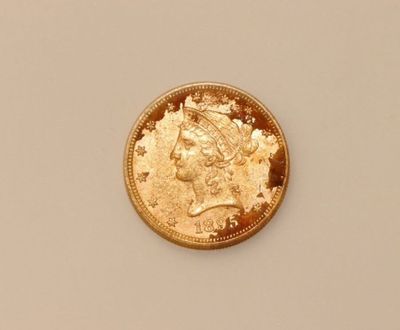 an image of a gold coin with a woman ' s head on it