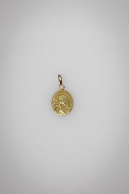 une pièce d'or à l'effigie de Jésus