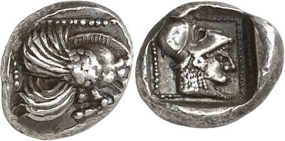 a silver coin with an image of a man and a woman on it