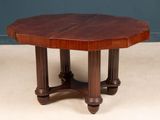 a wooden table with two legs and a wooden top