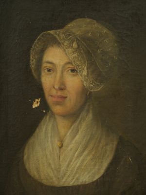 un vieux tableau représentant une femme coiffée d'un bonnet, tenant un papillon dans la main
