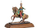 statue of a man riding a horse with a hat on top of his head