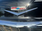 a close up of a car ' s emblem on the front of it