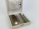 a box with a set of spoons and spoons in it