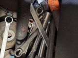 a pile of tools sitting on top of a table