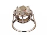 a close up of a ring with a large stone in it