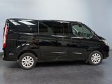a picture of a black van parked in a garage