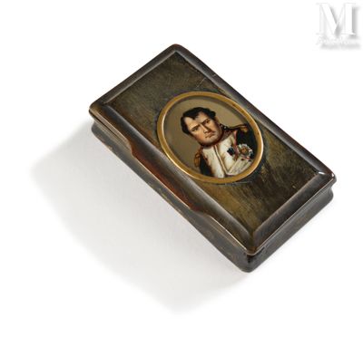 a picture of a small box with a picture of a man and a dog