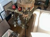 a room with a lot of antiques on the shelves