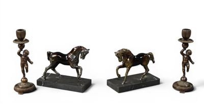 three bronze figurines of a horse and a man with a top hat