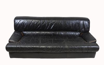 black leather sofa on a white background with a white background