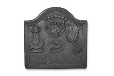 an image of a cast iron plaque with a crown on it