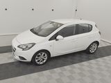 a picture of a white car parked in a garage