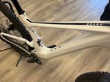 the bike is sitting on the floor in the room