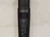 an image of a close up of a hair clipper on a table