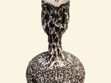 a black and white picture of a vase on a white background