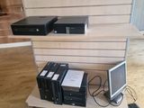 a lot of electronics that are sitting on a shelf