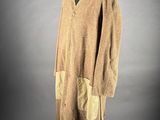an image of a coat on a mannequin stand