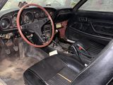 a car that has a steering wheel and a dash board