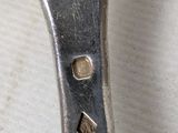 a close up of a pair of scissors on a table