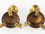 pair of antique brass candlesticks with candlesticks on each side