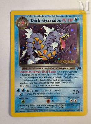 a close up of a pokemon card hanging on a wall
