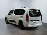 a picture of a white van parked in a room
