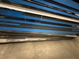 a close up of a bunch of metal bars sitting on top of a floor