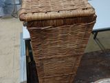 a wicker basket that is sitting on top of a table