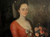 tableau représentant une femme en robe rouge tenant un bouquet de fleurs