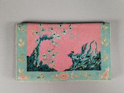 une image représentant un sac à main rose et bleu orné d'une illustration représentant une vague