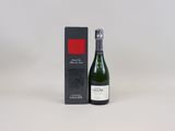 a bottle of wine sitting next to a box of wine