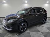 the black nissan suv is parked on a checkered floor