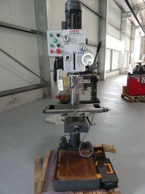 a machine that is sitting on a pallet in a warehouse