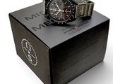 a watch that is sitting on top of a box