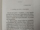 an open book with a black and white title on it