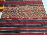 several rugs are laid out on the floor in a room