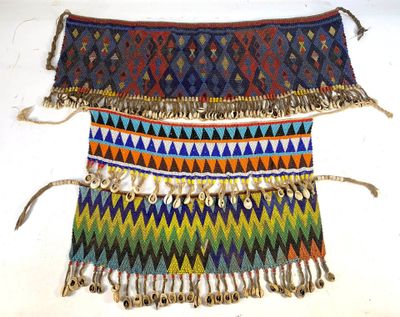 an image of a multicolored beaded belt with bells