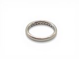 an image of a close up of a ring on a white surface