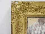 a picture of a man that is looking at himself in the mirror