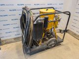 a close up of a machine on a cart in a room