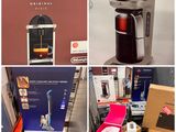 Plusieurs modèles différents de machines à café sont exposés dans un magasin.