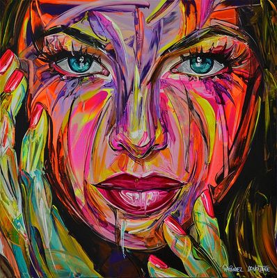 un tableau représentant le visage d'une femme recouvert de peinture colorée