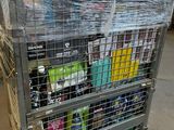 a metal cart with many items in it in a warehouse