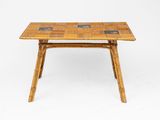 an image of a table made out of bamboo with a tile top
