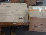 several boxes are stacked on top of each other in a warehouse