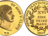 an image of a gold coin with the head of a man on it