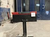 an image of a machine in a warehouse setting