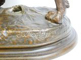 a bronze statue of a horse on a pedestal