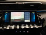 a picture of a car ' s dashboard with a digital display